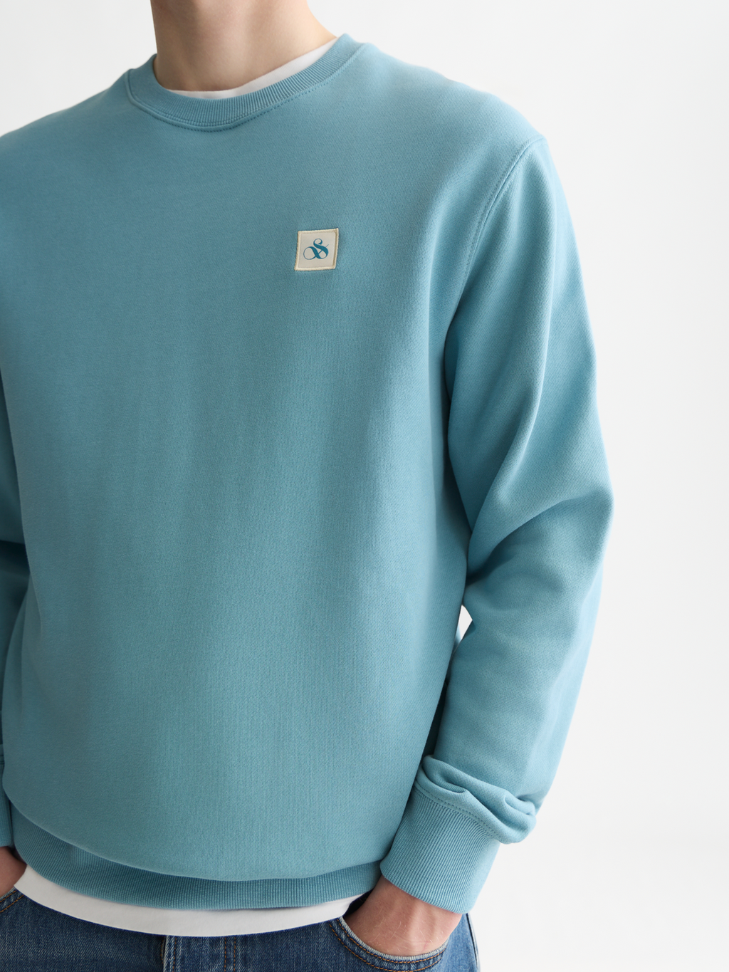 Essentials Logo Badge Regular-Fit Sweatshirt