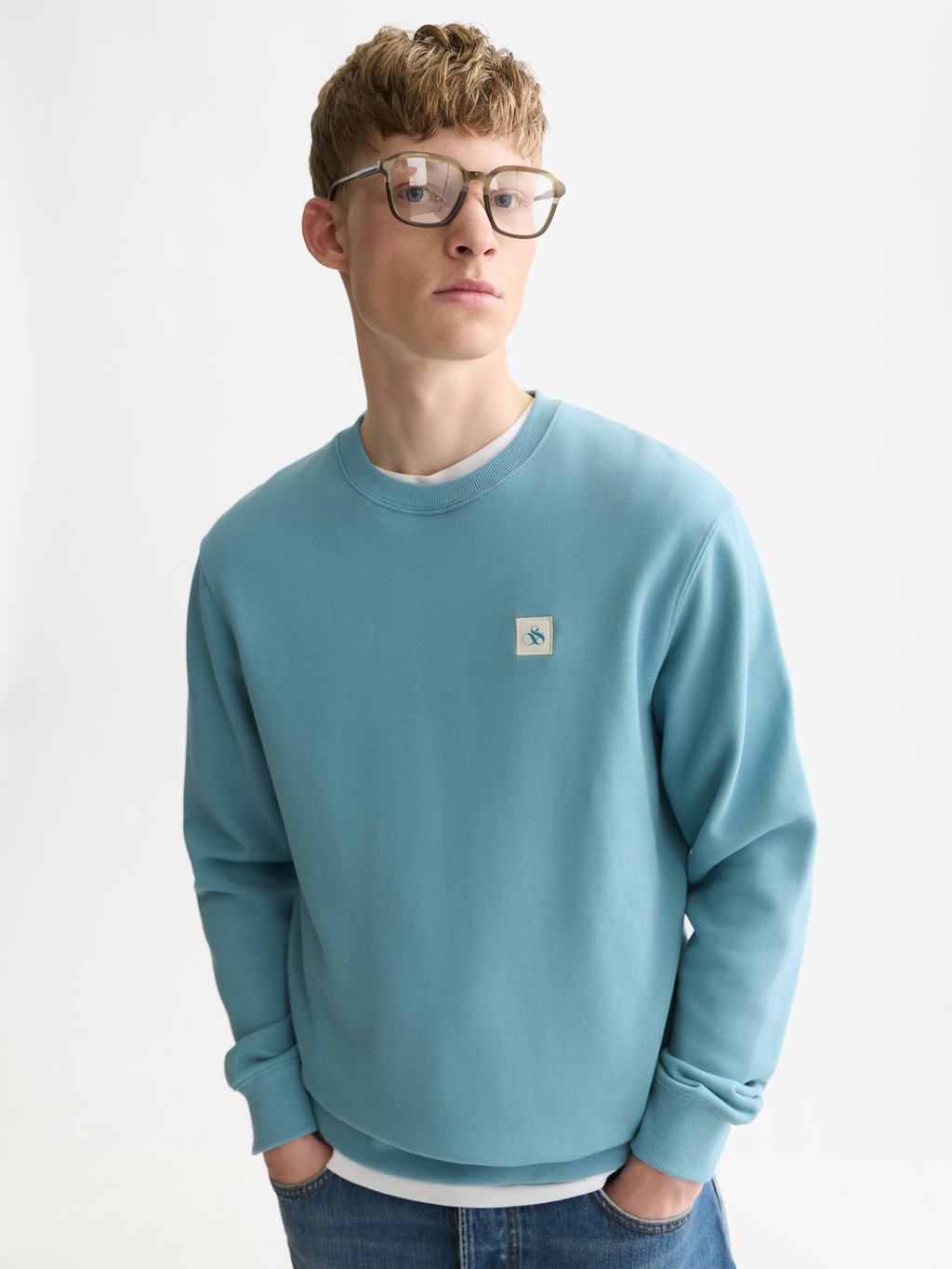 Essentials Logo Badge Regular-Fit Sweatshirt