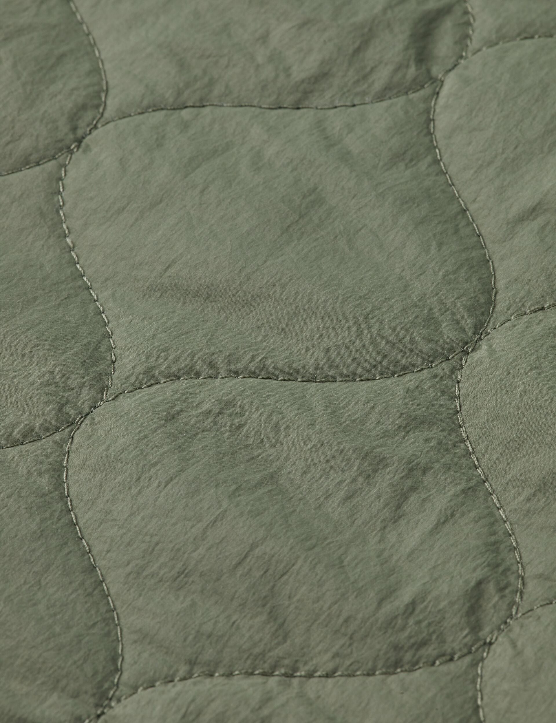 Reversible quilted bomber