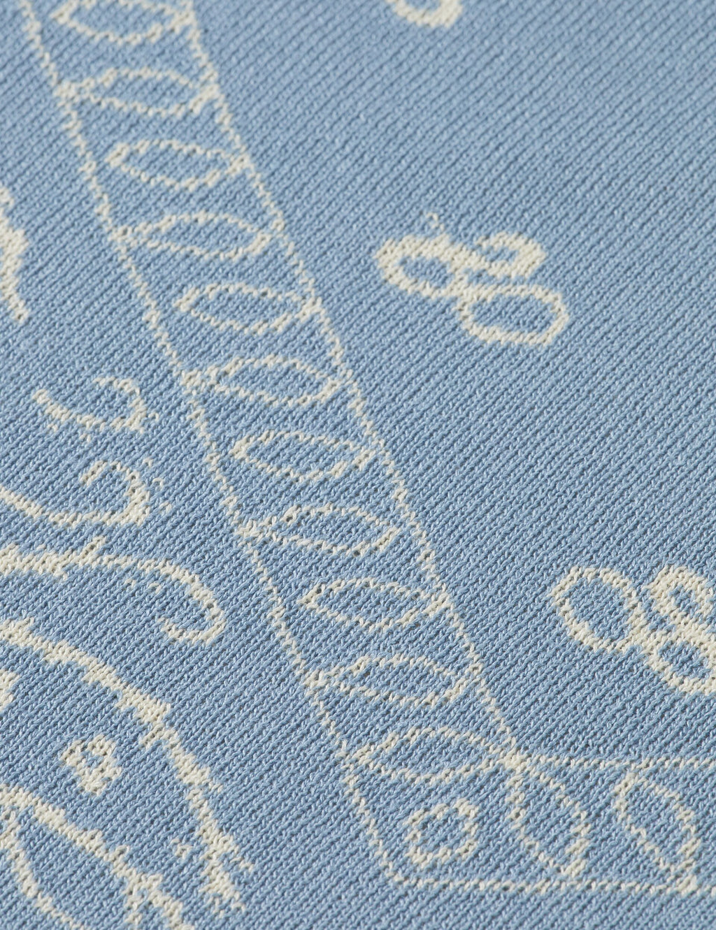 Jacquard knitted triangle scarf