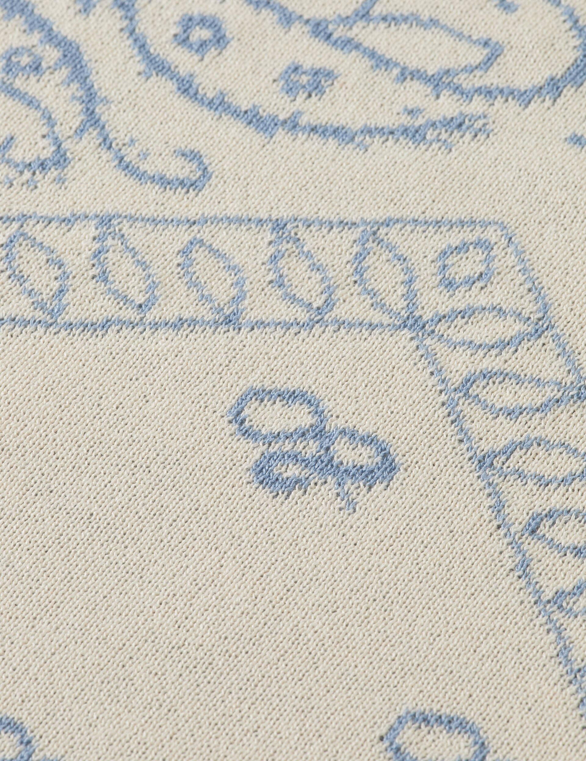 Jacquard knitted triangle scarf