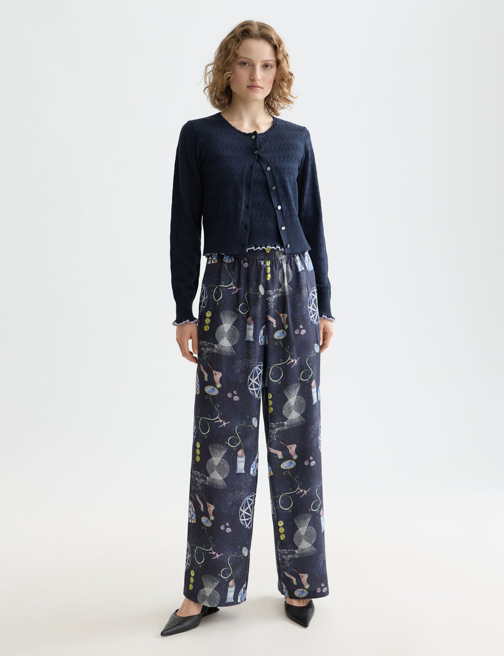 Gia - Mid rise wide leg elasticated trousers in block print