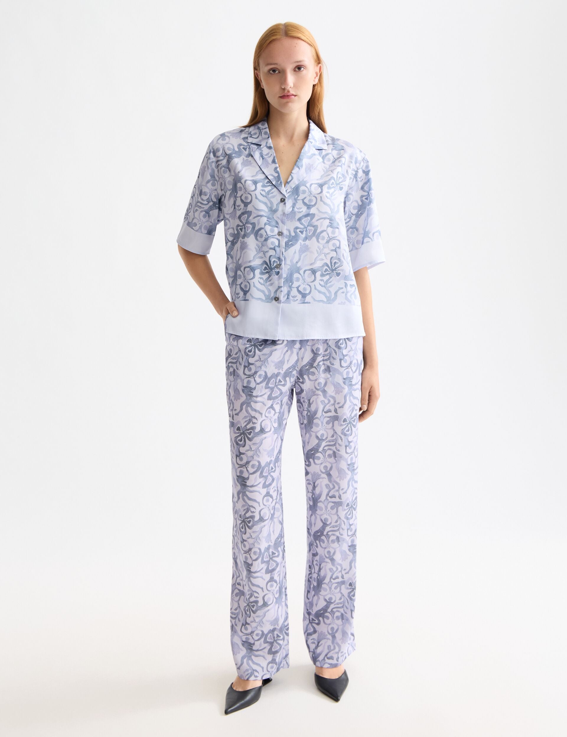 Gia - Mid rise wide leg elasticated trousers in block print
