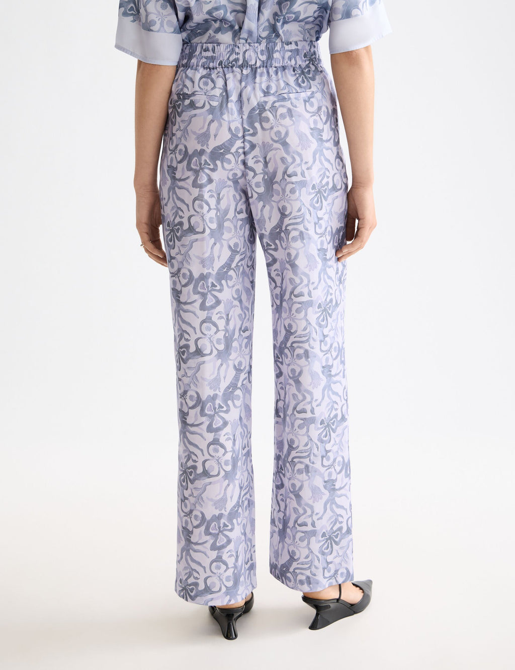 Gia - Mid rise wide leg elasticated trousers in block print